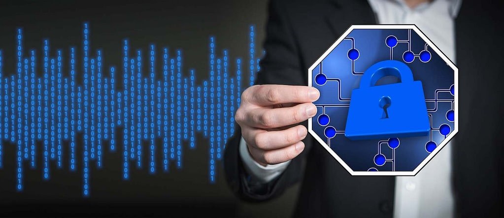 Cybersecurity - man holding lock