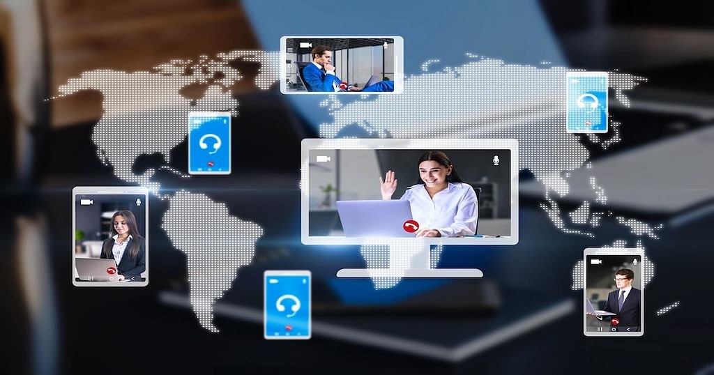 workplace with devices and a creative globe map with VoIP calls