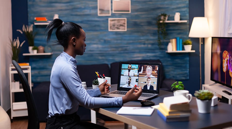 employee communicating via video call with other employees using a mobile apn data solution.